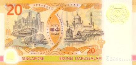Сингапур 20 долларов 2007 г «40-летие Соглашению взаимозаменяемости валюты Брунея и Сингапура» UNC пластик Юбилейная